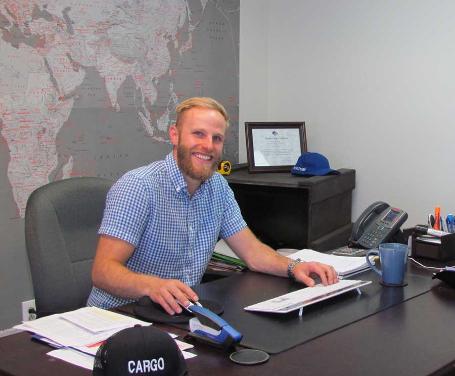 andrew working at his desk