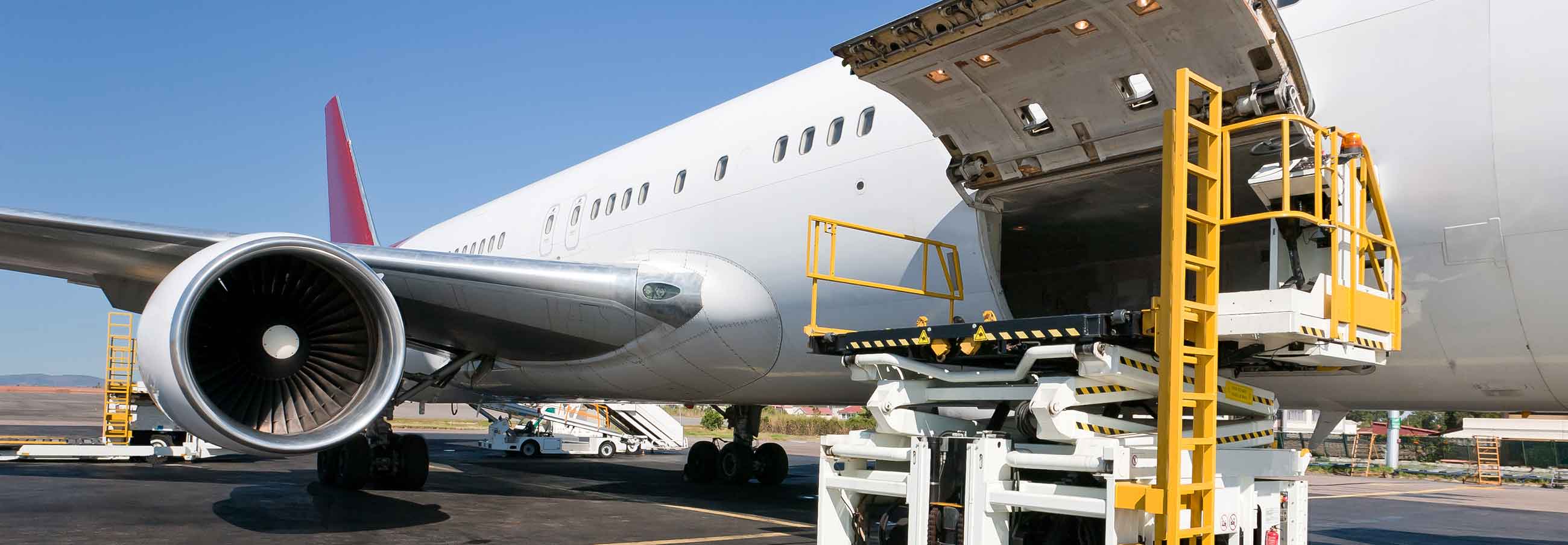 cargo plane being loaded with air freight packages