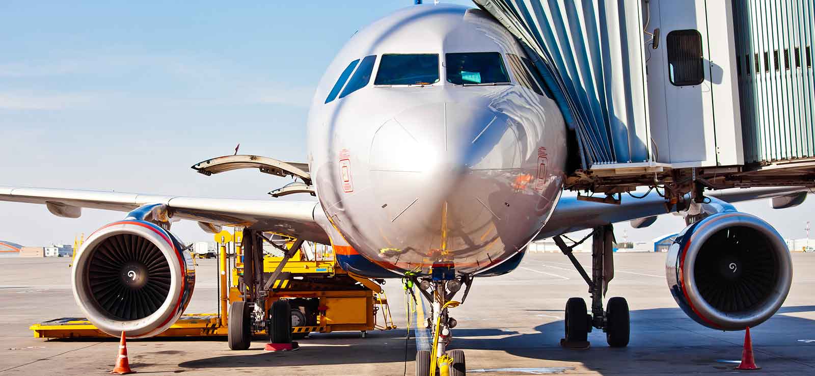 cargo plane being loaded with air freight and people